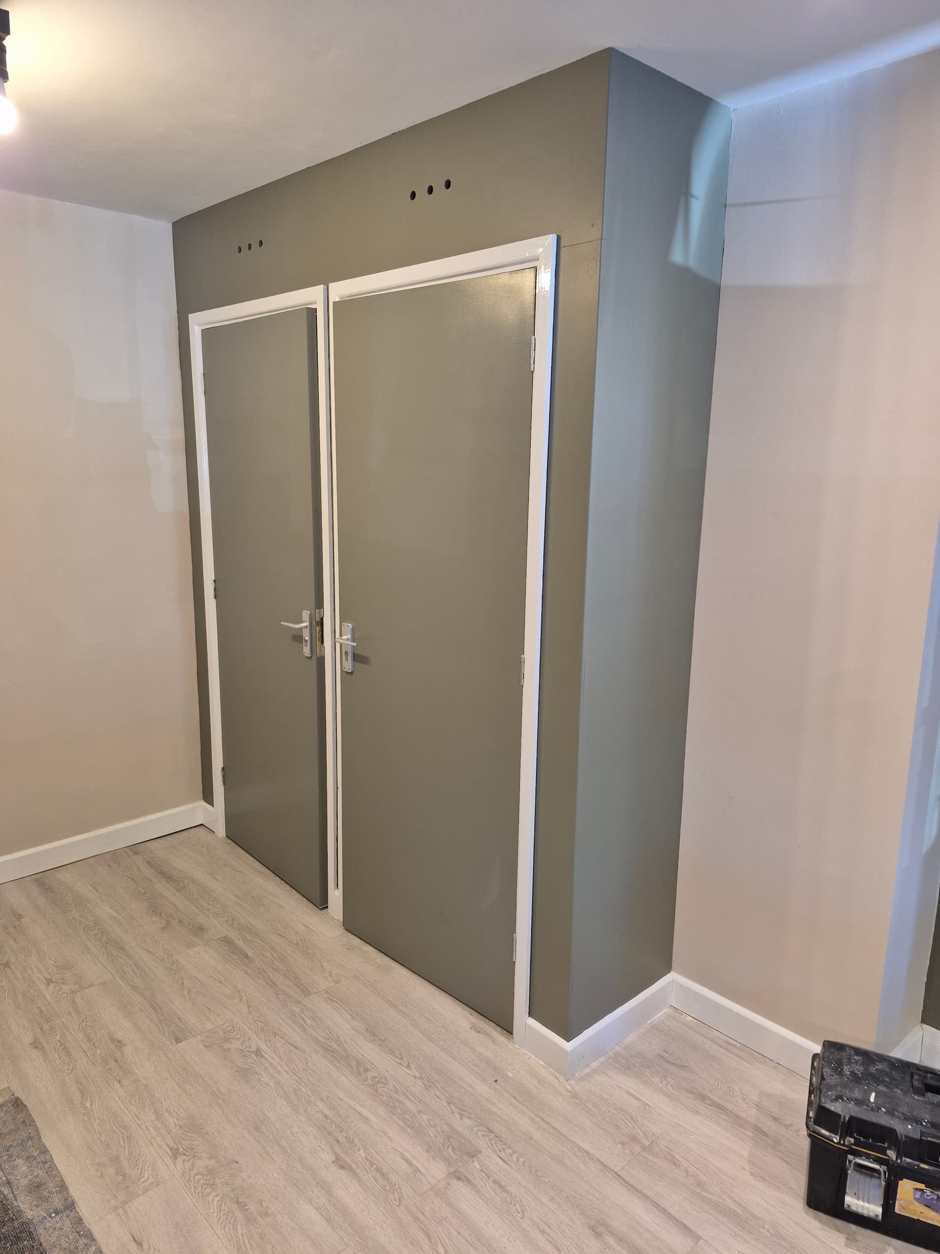 Freshly decorated interior walls with gloss-painted woodwork expertly done