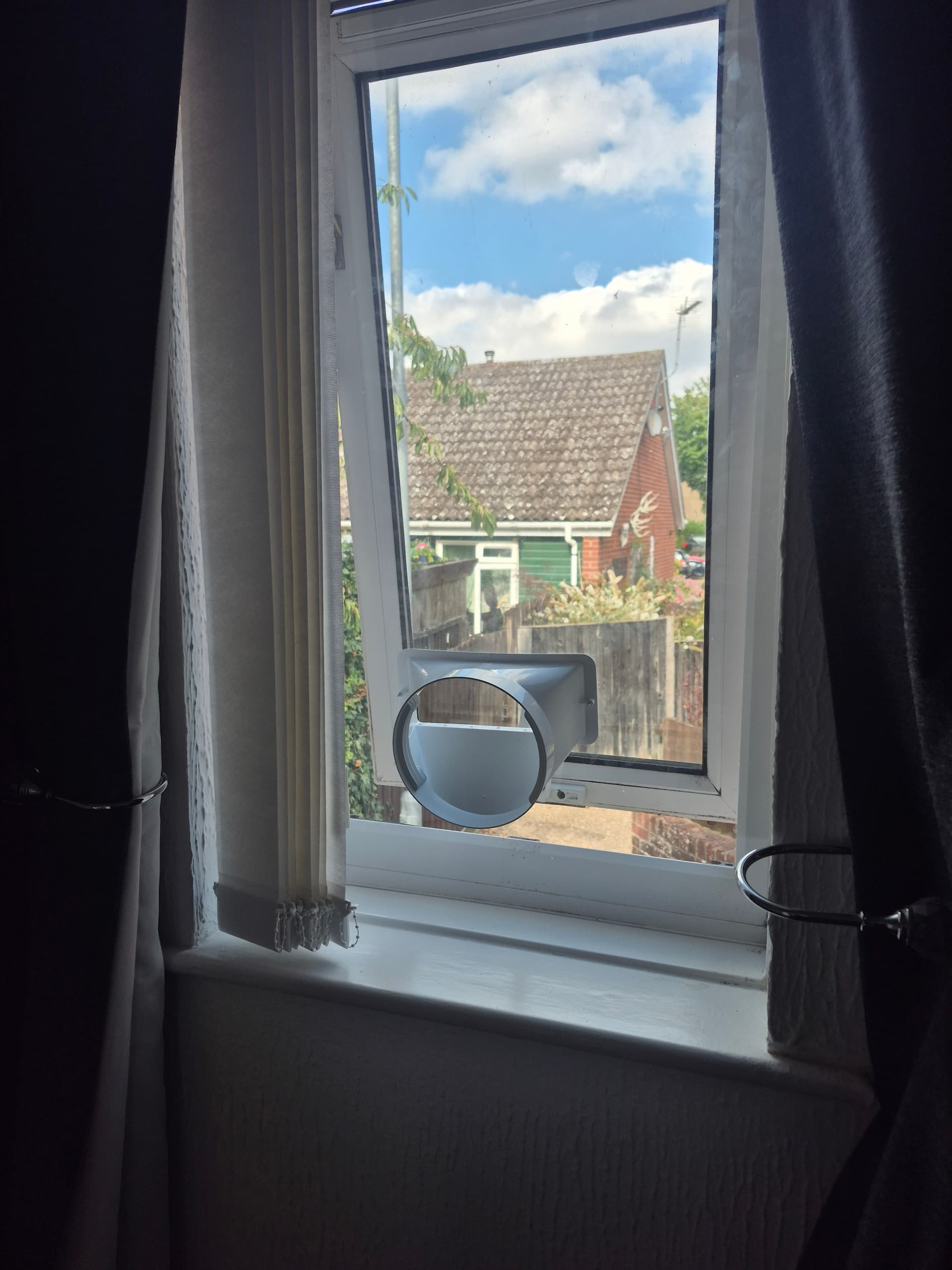 5mm Perspex sheet cut and fitted into a rebate around an air conditioning Notykin Street.