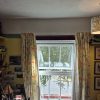 After Sturdy curtain pole cleanly fixed and holding drapes flush against a window frame Trafford Road