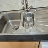 New kitchen mixer tap successfully installed and polished during a plumbing upgrade job at Morgan House based in Norwich