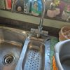 Old kitchen sink taps before replacement