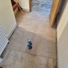 Water-damaged floor being restored with new replacement boards